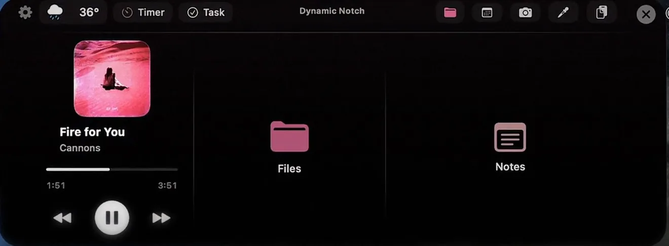 The notch panel tinted pink to match the album art of the track playing, with matching Files and Notes icons